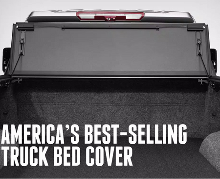 A black retractable BAK MX4 (GEN3) truck tonneau cover shown installed in the bed of a pickup truck, with large white text reading 'AMERICA'S BEST-SELLING TRUCK BED COVER' across the lower portion.