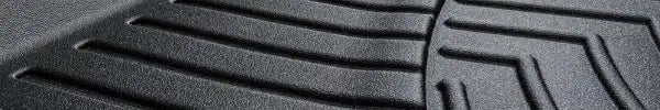 Premium heavy-duty rubber car mats, custom-fit and built for all-weather protection, made in the USA.
